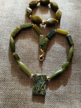Green jade necklace and stretch bracelet .